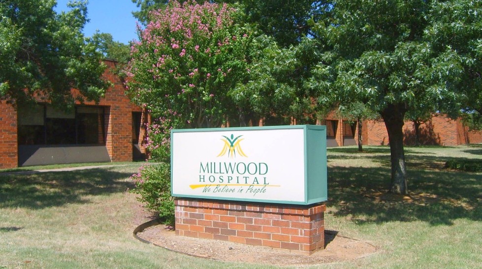 Millwood Hospital campus sign outside facility