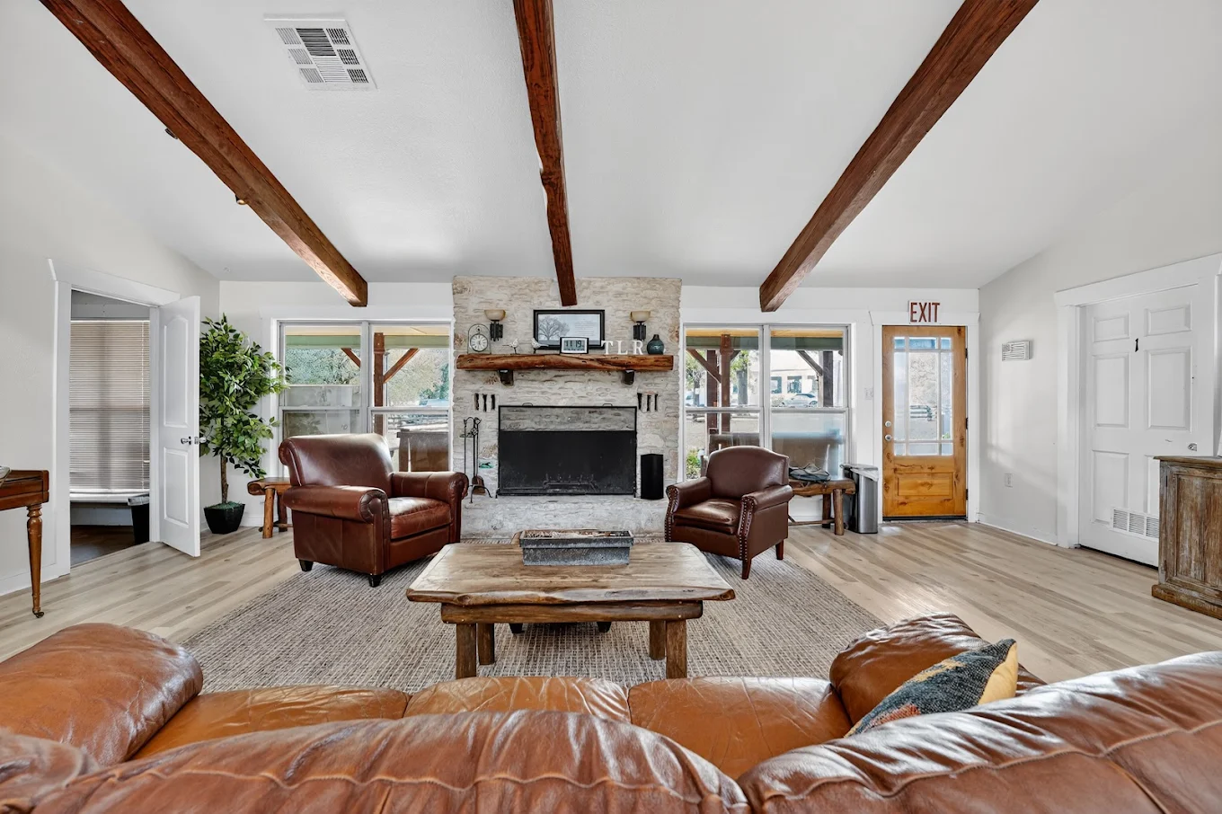 Main lounge with fireplace and seating at the recovery center