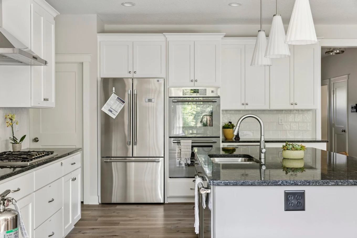 Modern kitchen with white cabinets and island