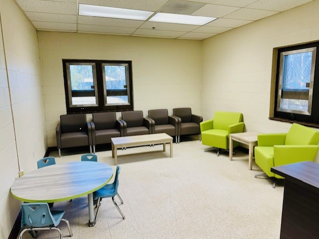 Conference room with chairs around a table