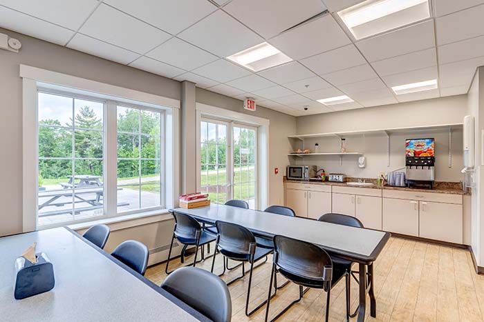 Tables beside self-serve kitchen