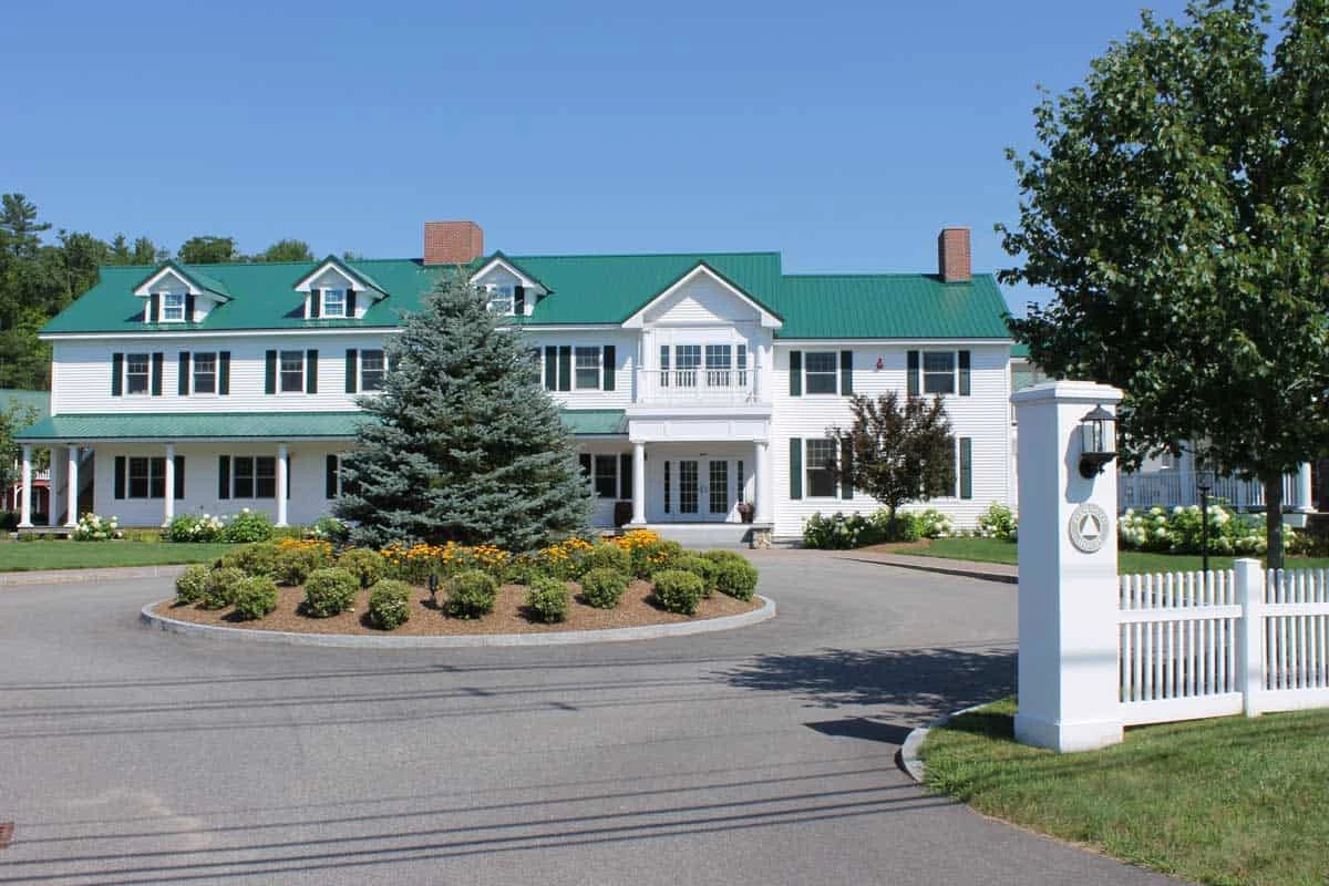 Circular driveway leading to white main building