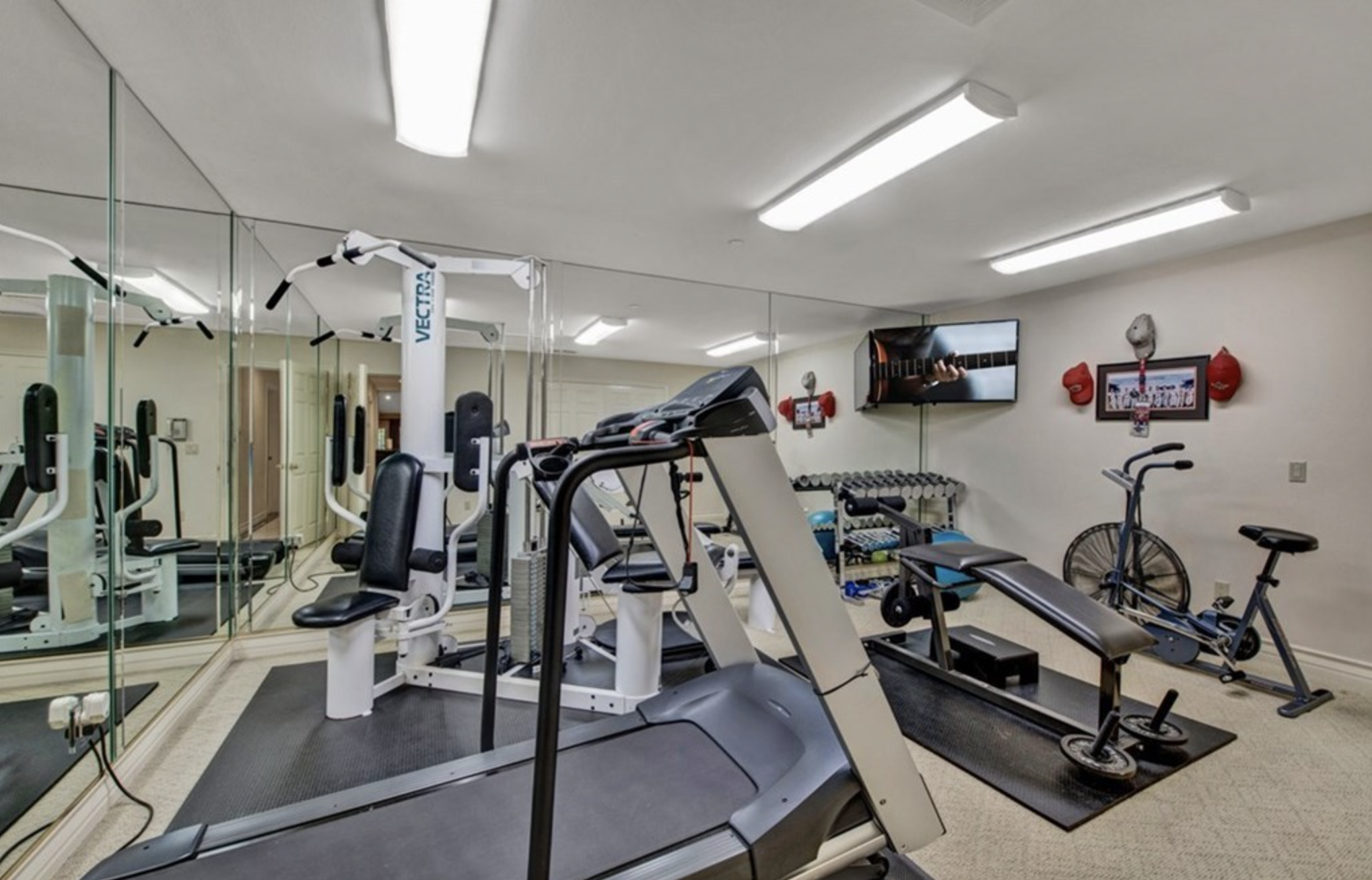 Gym with exercise equipment.
