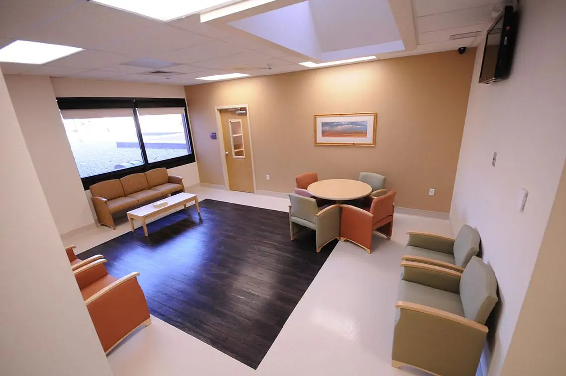 Modern waiting room with natural light and mixed seating