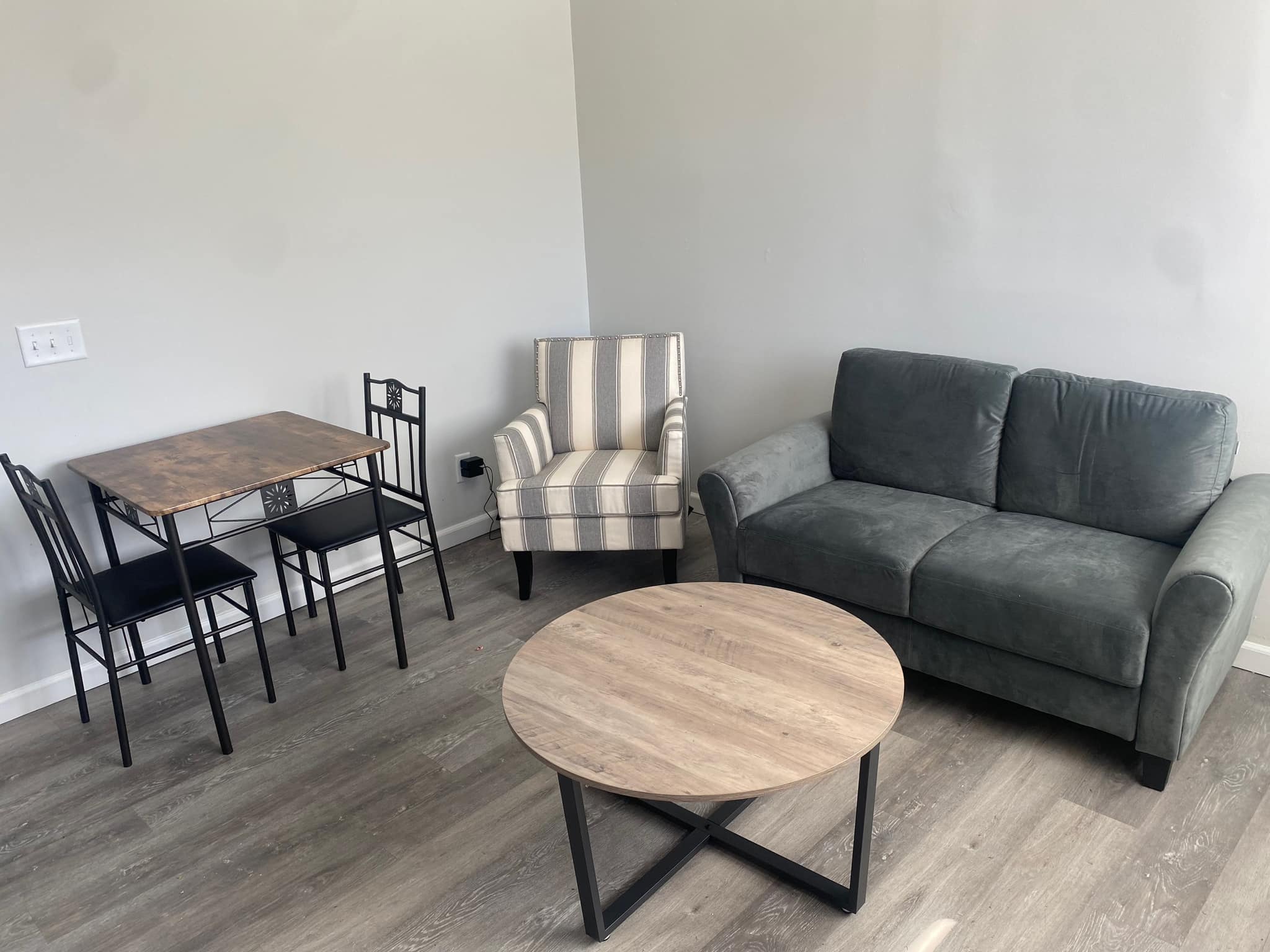 Round table and chairs under bright ceiling lights