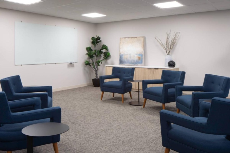 Group therapy room with chairs arranged in a circle