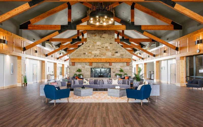 Large lounge with fireplace and modern seating