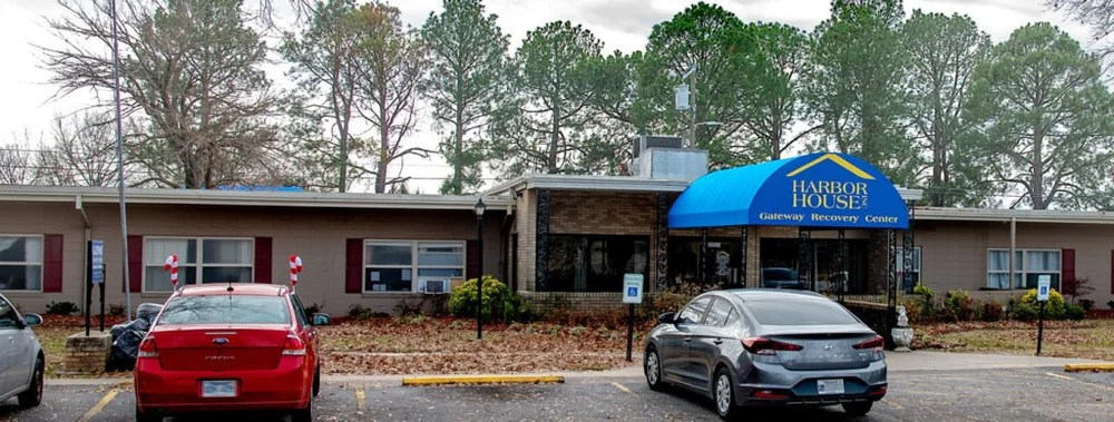 Front view of Harbor House Gateway Recovery Center with blue canopy