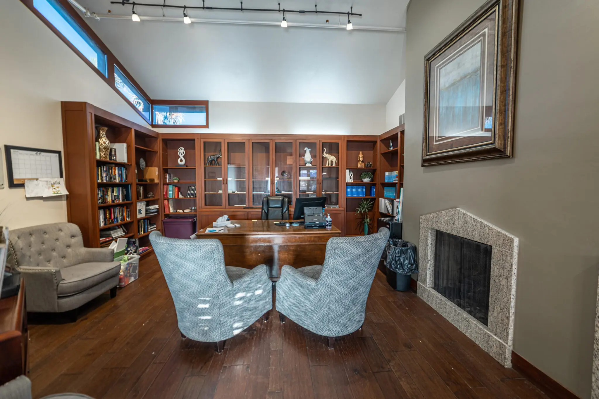 Private office with desk and seating for counseling