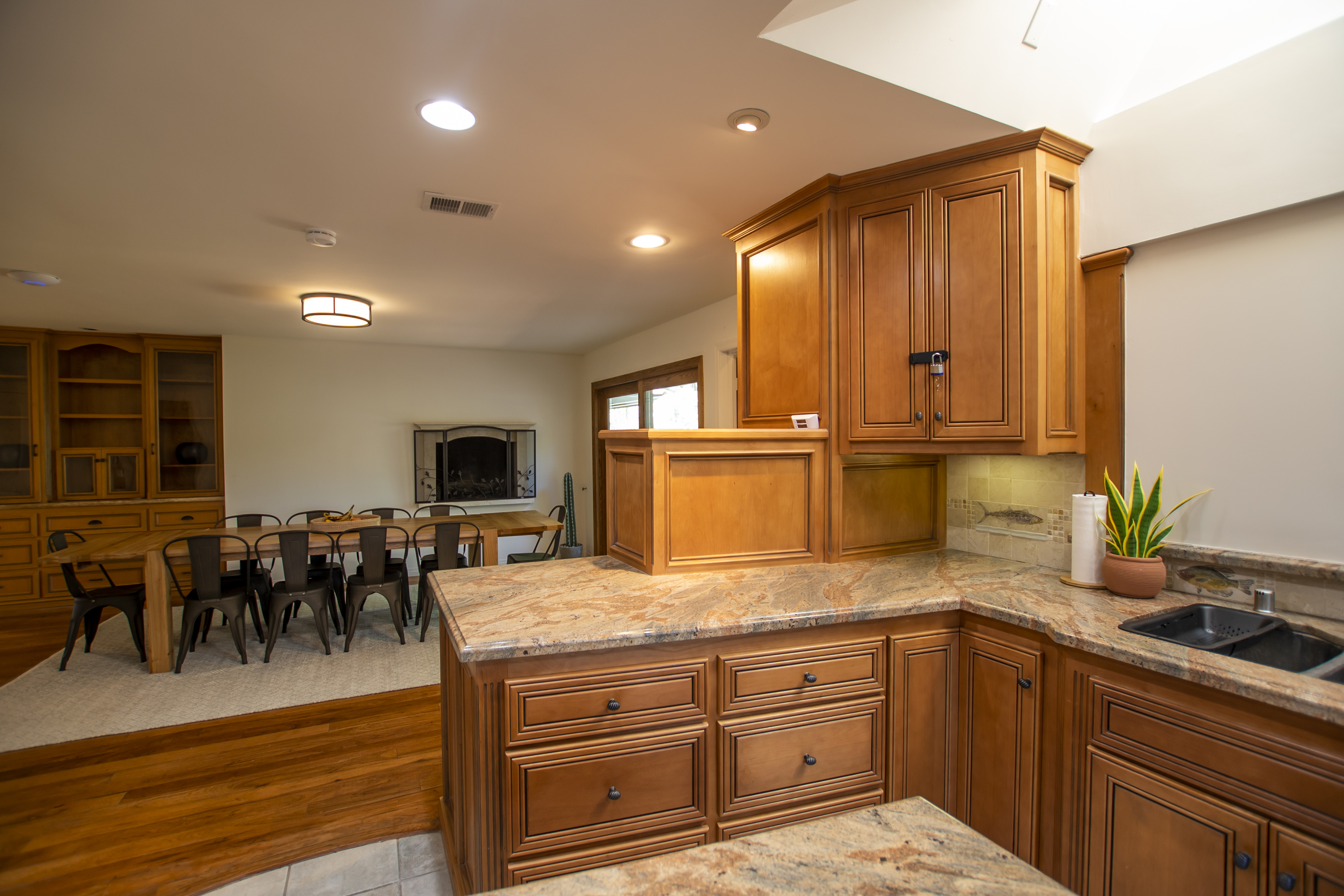 Kitchen with wooden cabinets and dining table