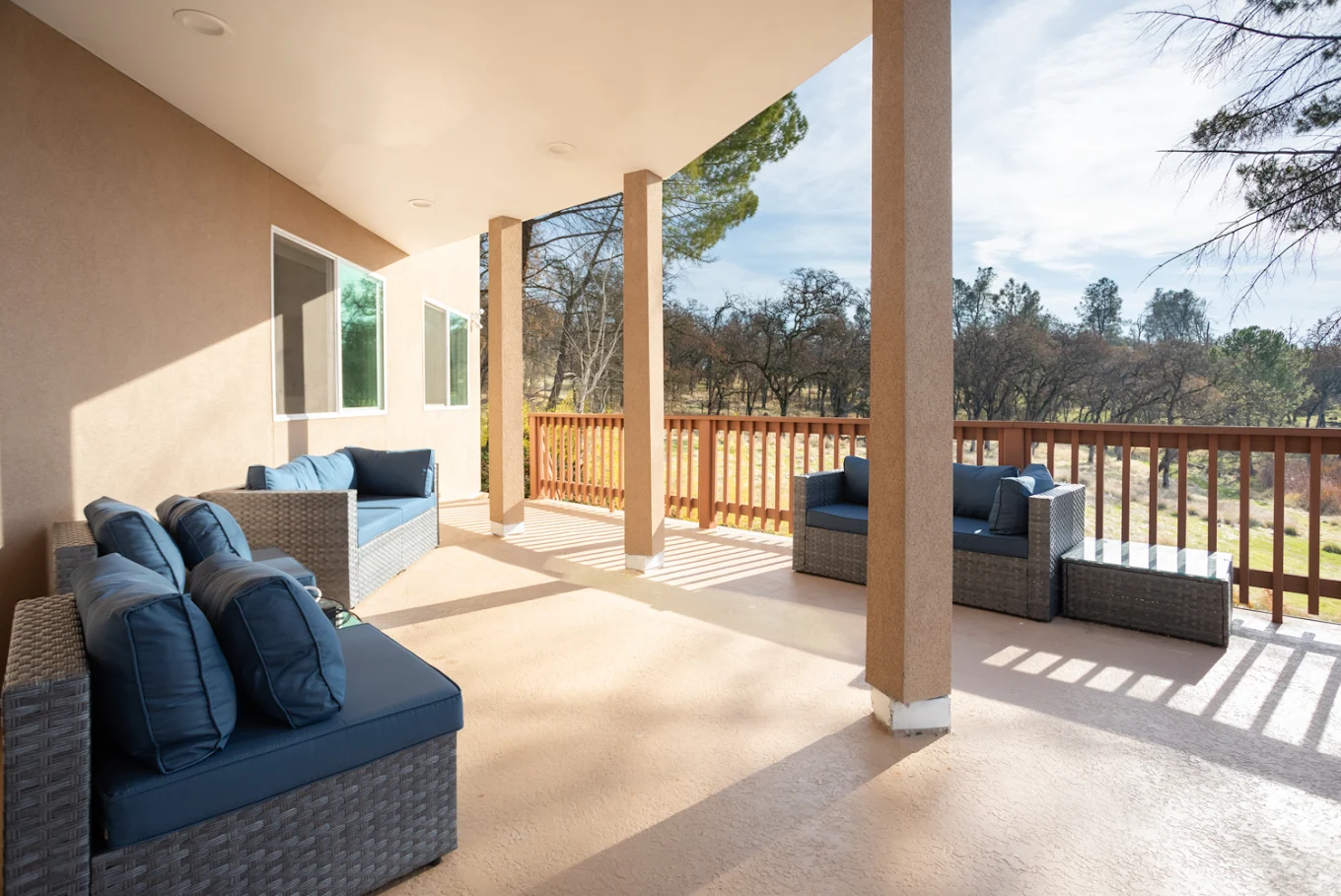 Covered patio with outdoor lounge chairs