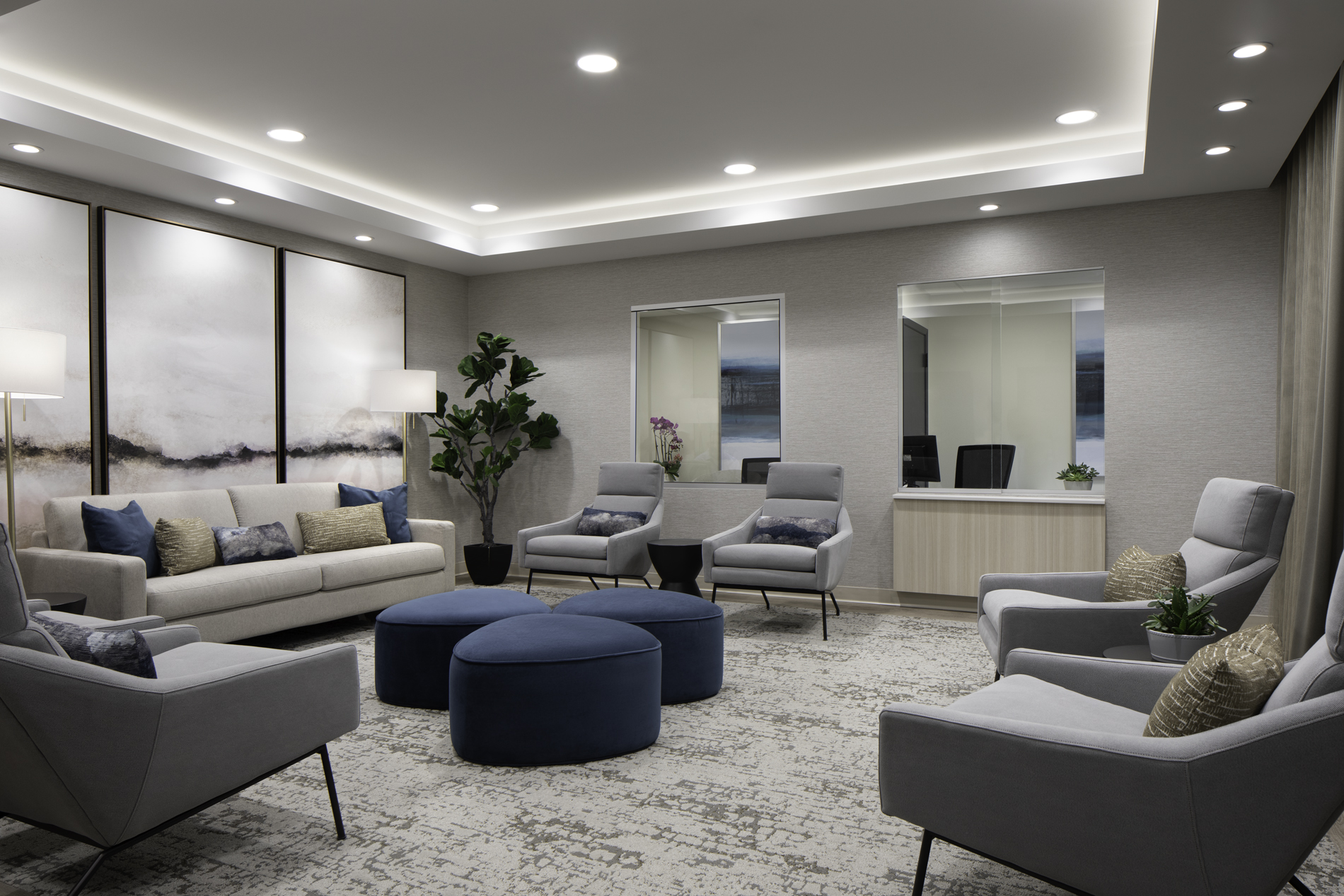 Lobby with sofas, lounge chairs, and soft lighting