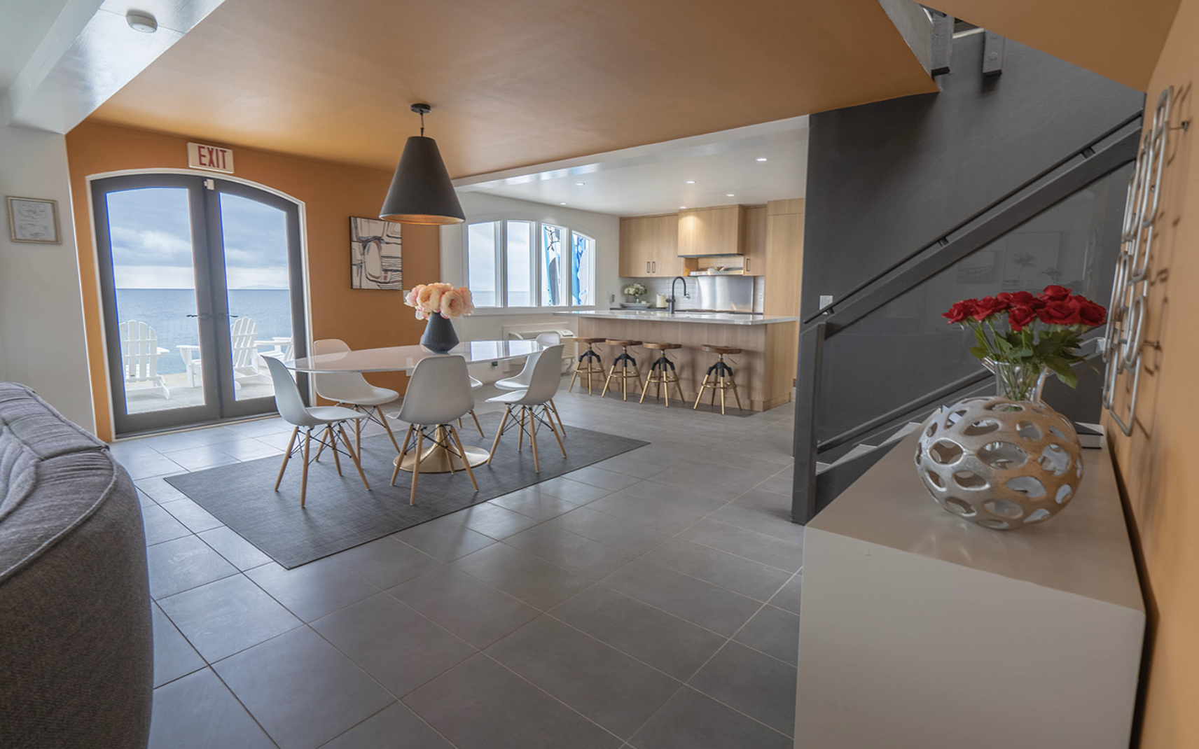 Shared living and dining space with ocean views