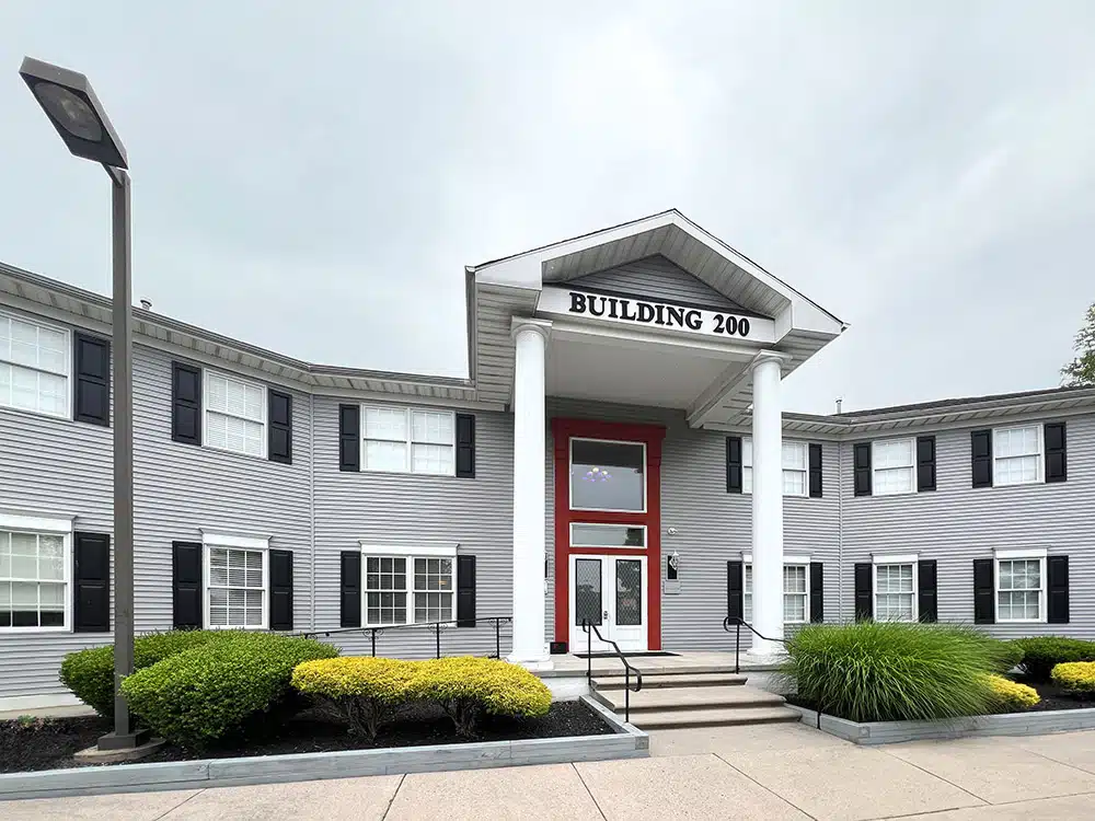 Two-story clinic building with columns and main entrance