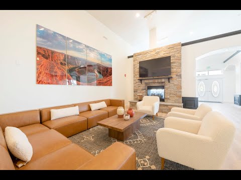 Women’s residential rehab lounge with fireplace and seating
