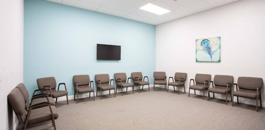Group therapy room with chairs arranged in a circle