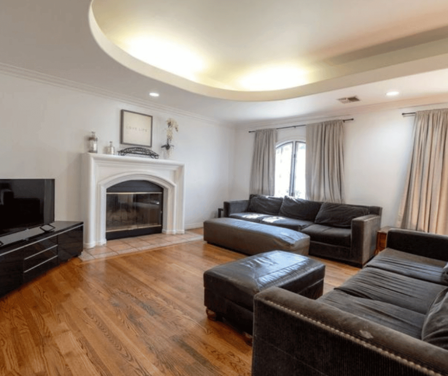 Indoor group lounge with sofas and television