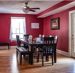 Communal dining room with table seating for residents