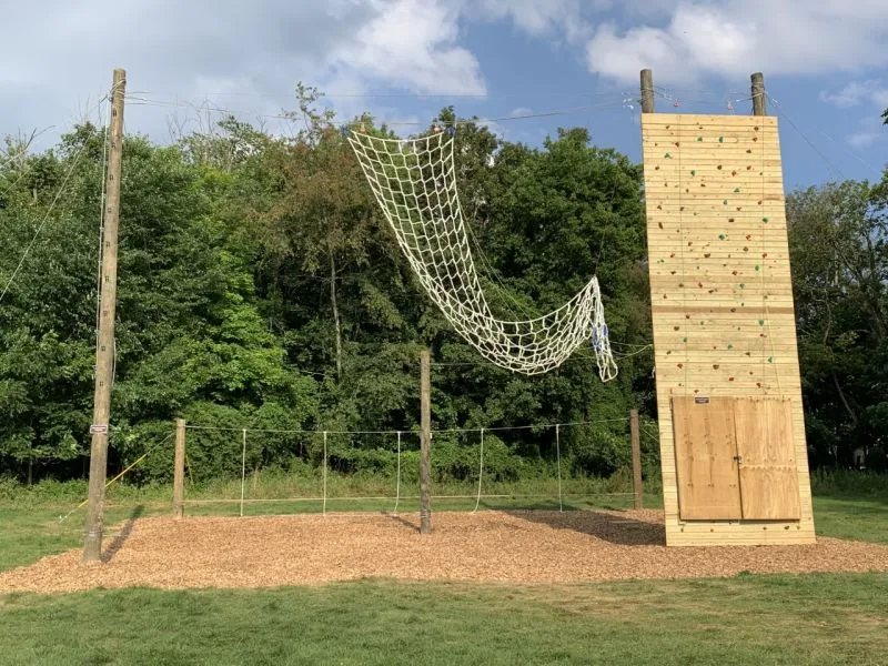 Outdoor ropes course and climbing wall at rehab center