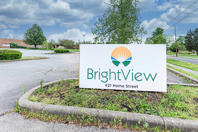 BrightView facility sign displaying the logo and 421 Home Street beside the parking lot in Georgetown, Ohio