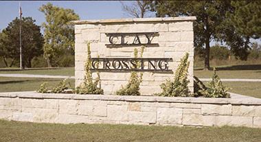 Stone entrance sign for Clay Crossing addiction treatment center