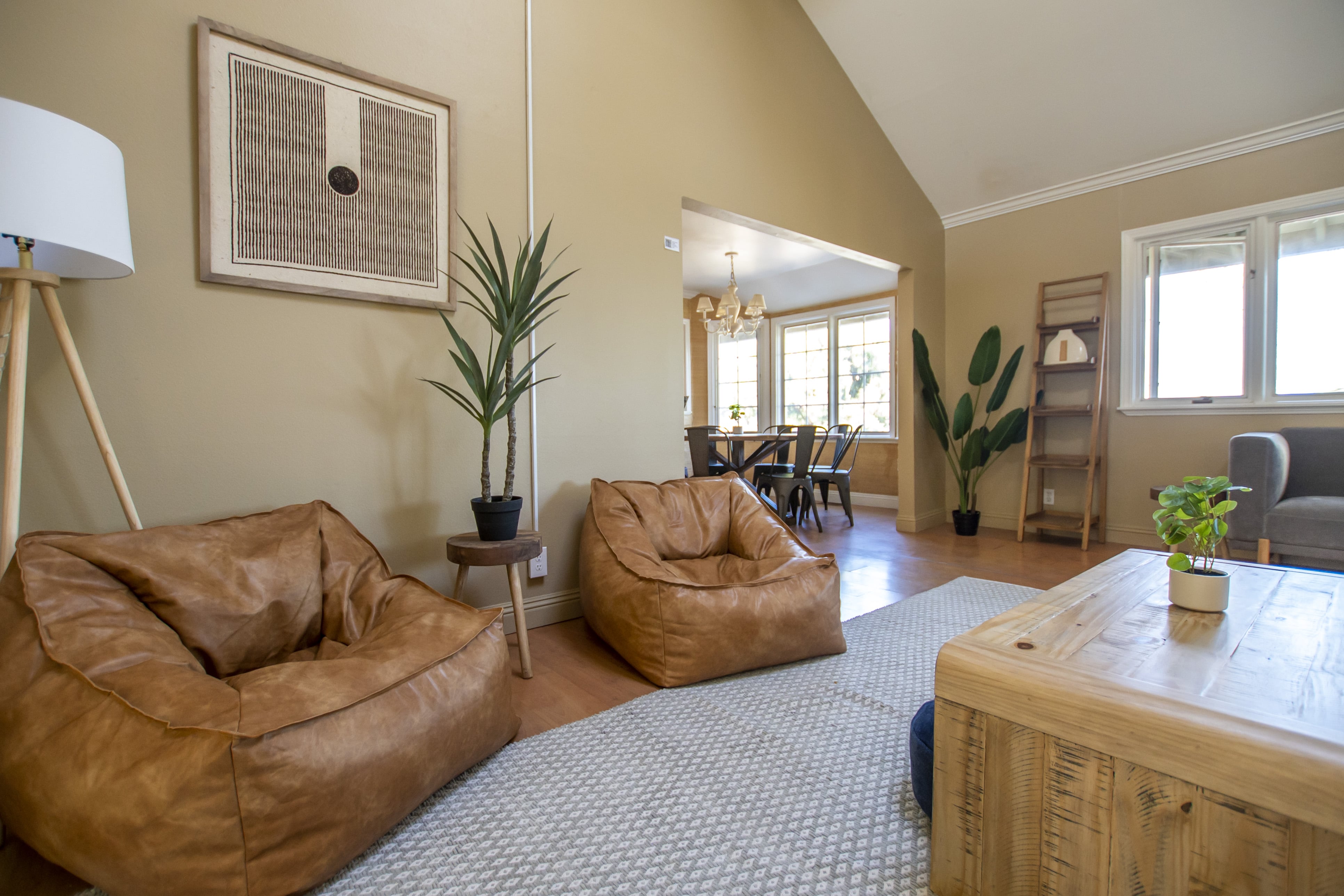 Cozy space with tan beanbags and potted plants