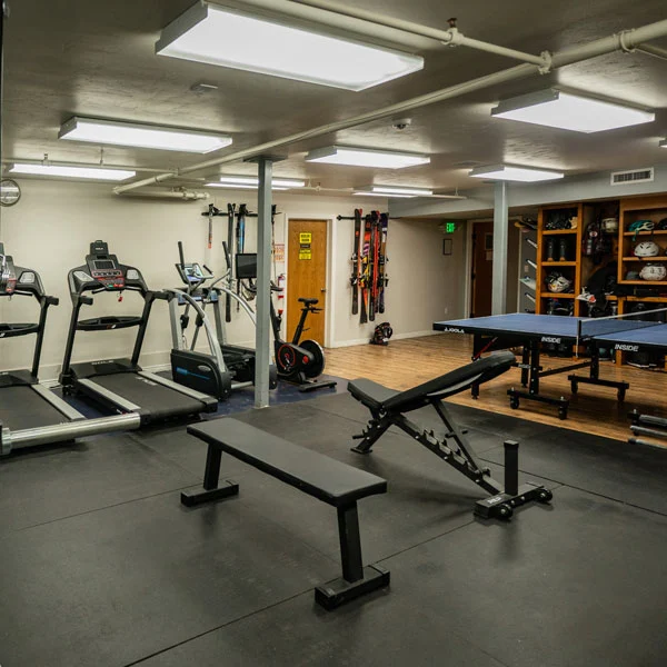 On-site fitness room with weights and cardio machines