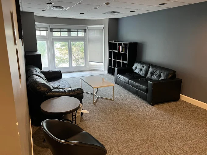 Lounge Area with Sofas and Shelving