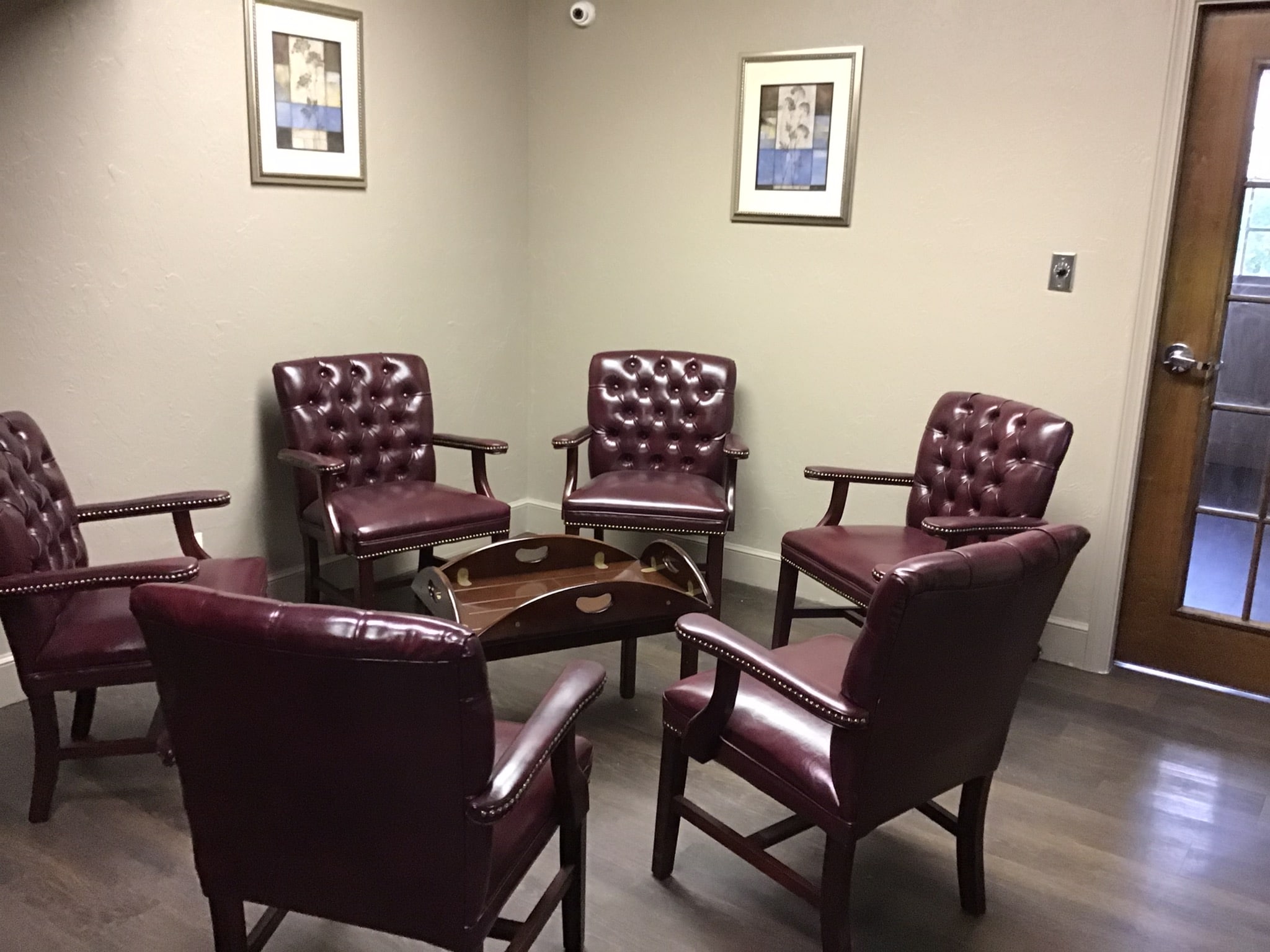 Meeting room with leather chairs in a circle
