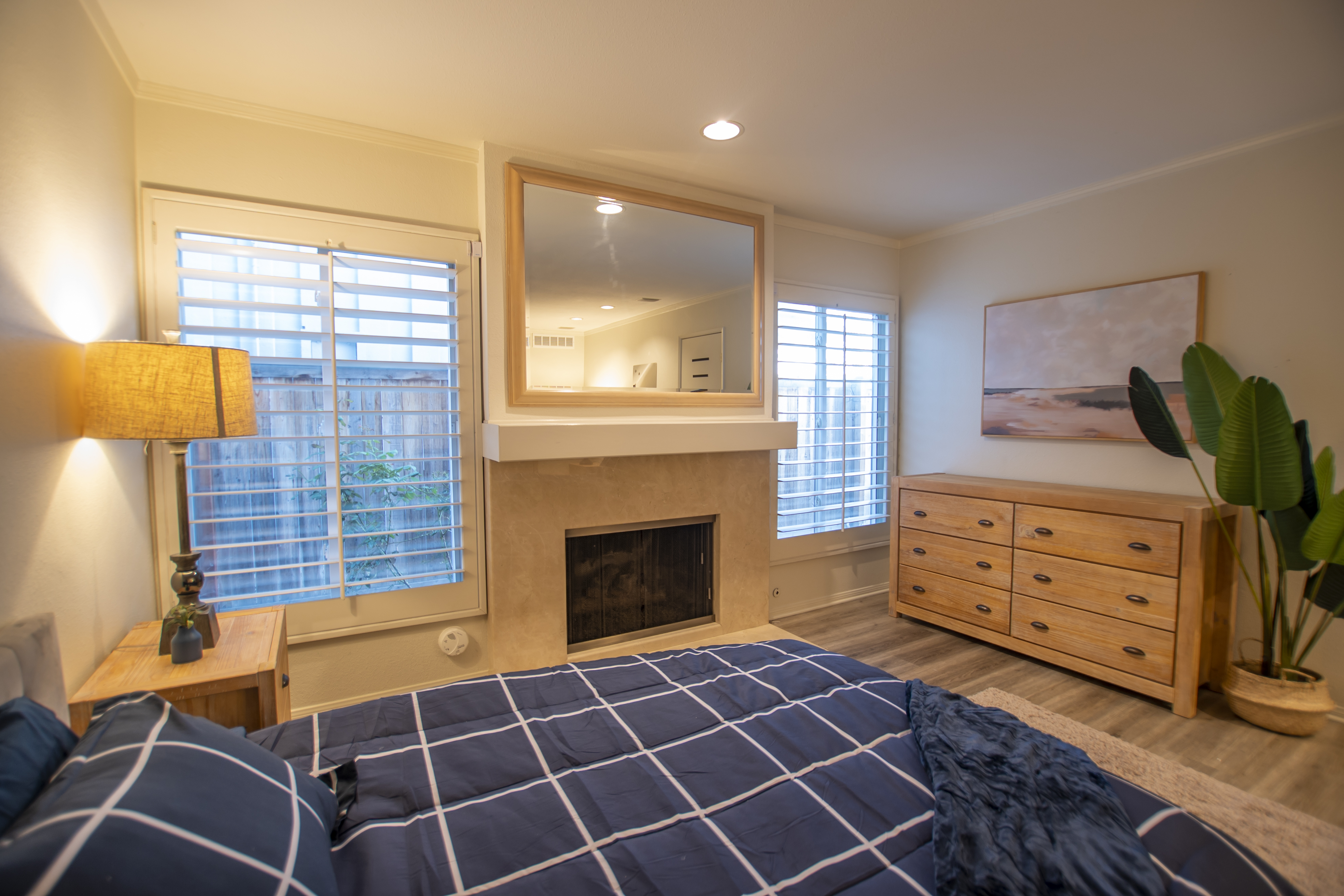 Cozy bedroom with twin beds and modern art
