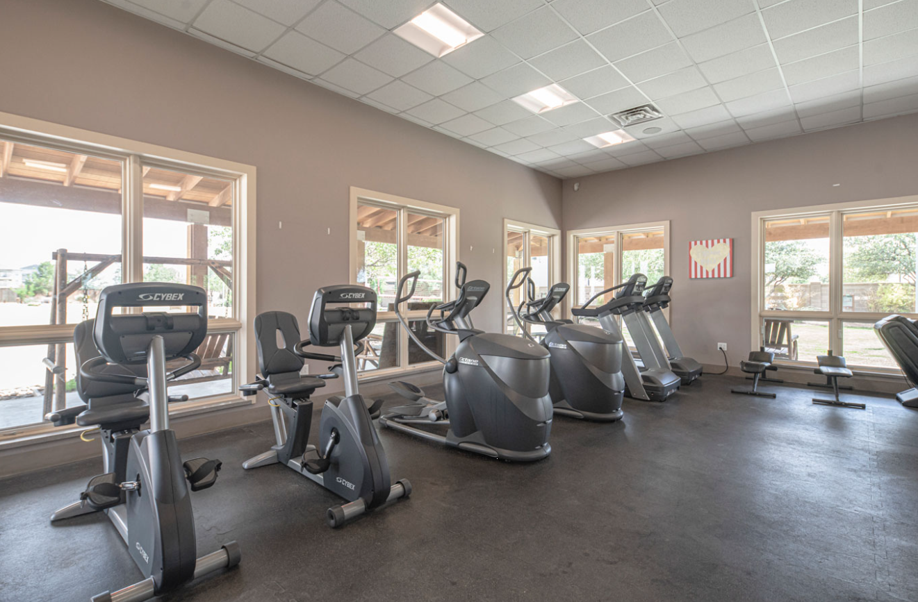On-site gym with cardio machines and exercise equipment