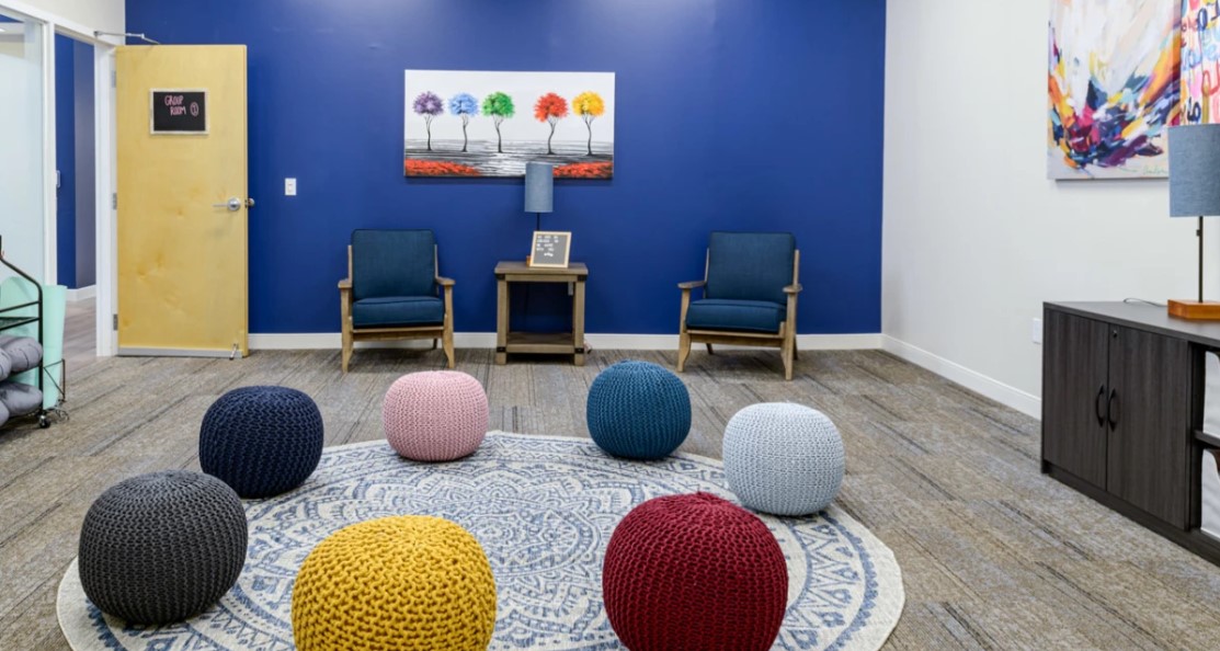Group therapy room with chairs.
