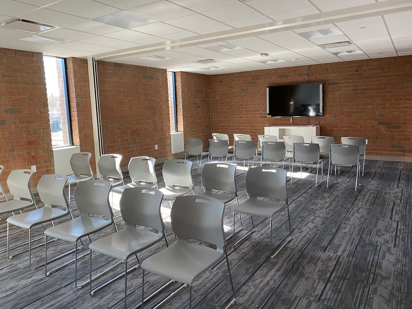 Group therapy session in a rehab facility room