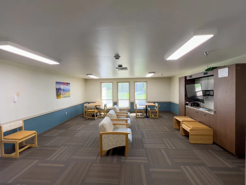 Lounge with TV and modern seating for relaxation