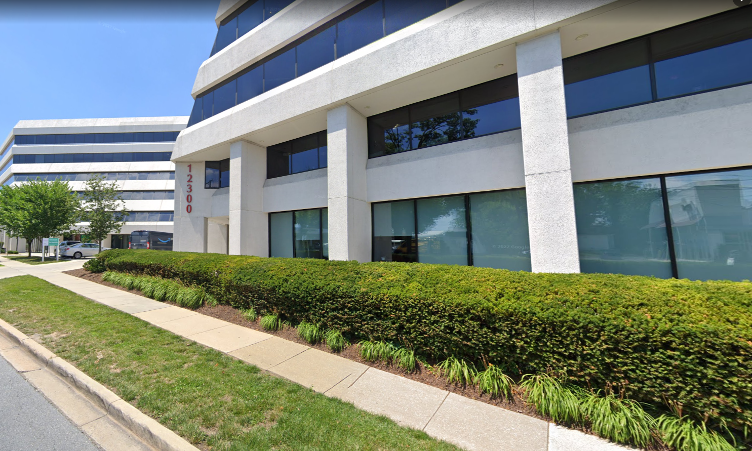 Facility exterior with signage and accessible parking.
