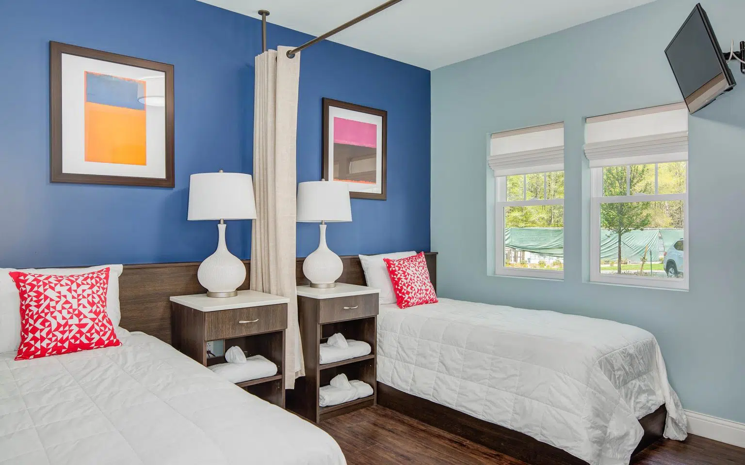 Shared bedroom with two twin beds.