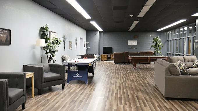 Spacious game room with air hockey and pool tables