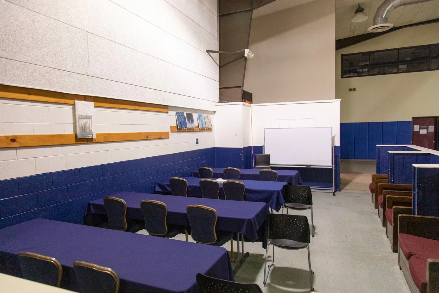 Classroom-style space with tables and chairs