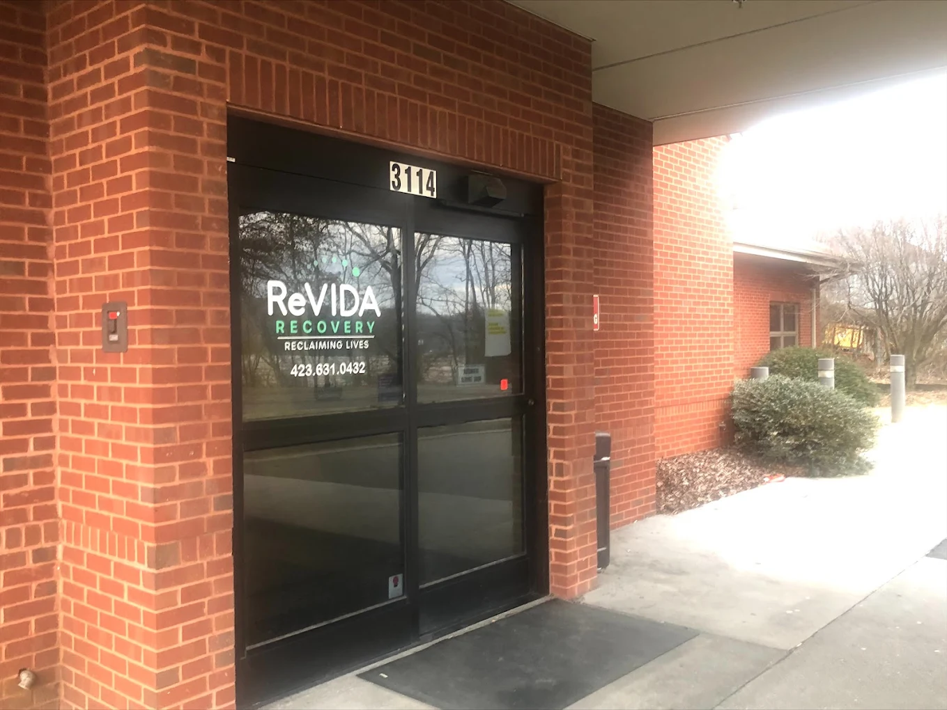 Entrance to ReVIDA Recovery with secure glass doors