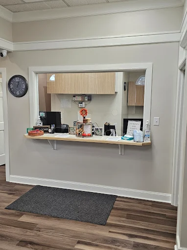 Windowed front desk with essentials and decor