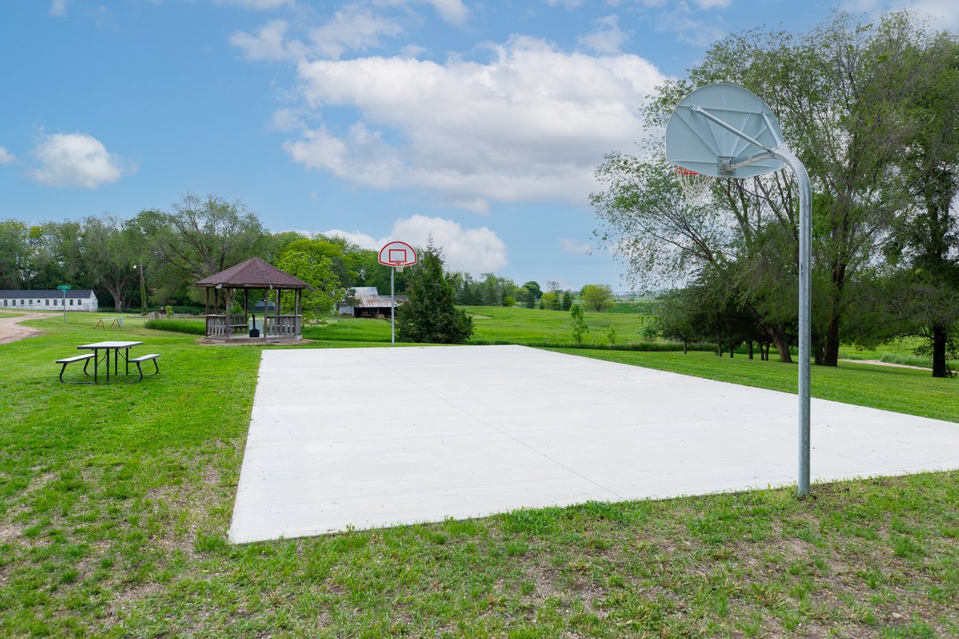 Outdoor basketball court and picnic area on treatment center campus grounds