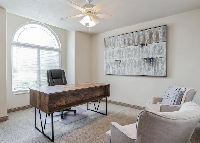 Desk and chairs in counseling room