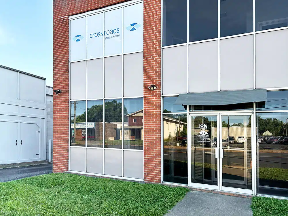 Crossroads treatment center exterior entrance with glass doors