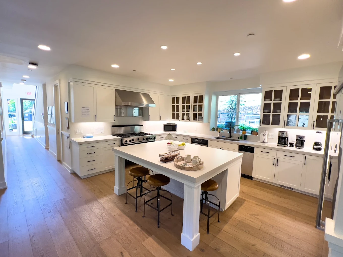 Shared kitchen with island seating and modern appliances