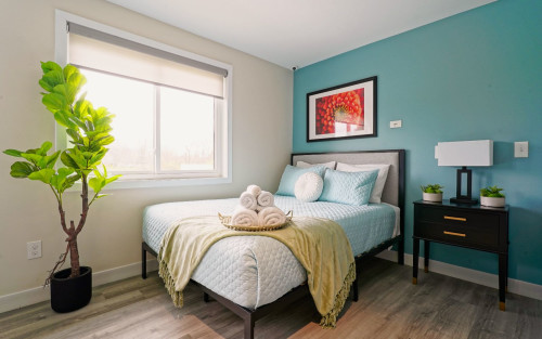 Private bedroom with double bed and large window