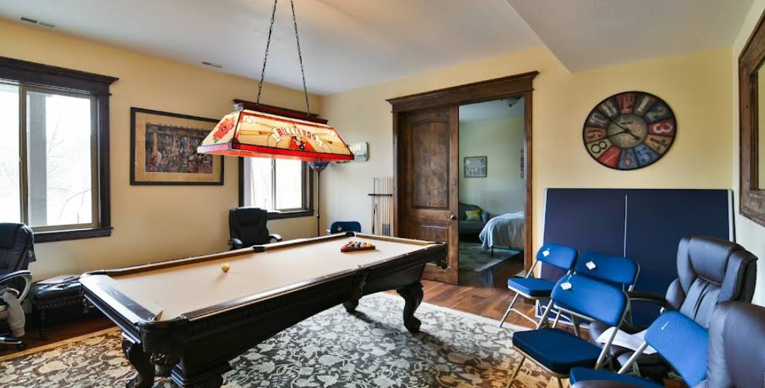 Recreation room featuring pool table and seating area