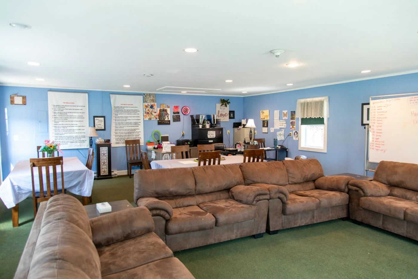 Cozy room with couches, tables, and decor