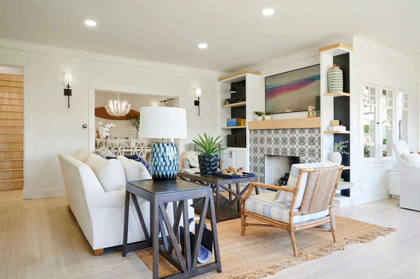 Bright living room with TV and cozy fireplace