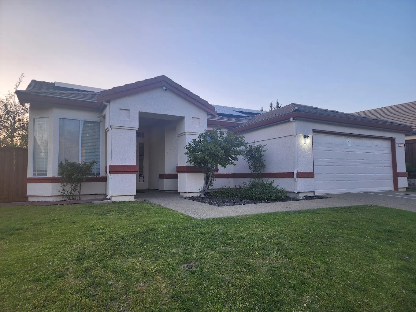 Rehab facility with white walls and red trim
