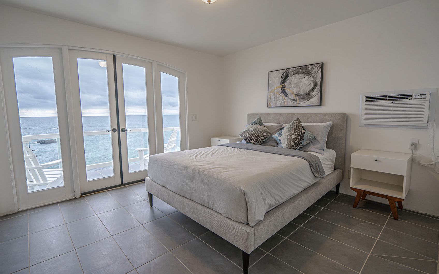 Private bedroom with ocean view and balcony access